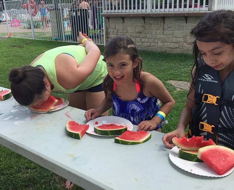 Watermelon eating contest. Kids.